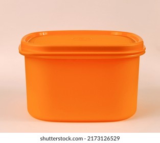 Yellowish Green Empty Tupperware Isolated In White Background.