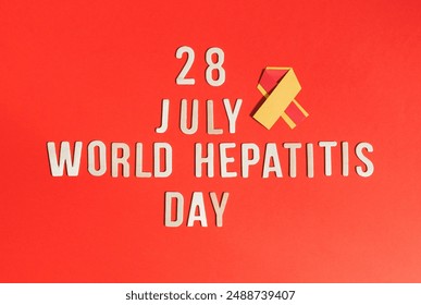 Yellow-red ribbon with wooden numbers July 28 World Hepatitis Day. - Powered by Shutterstock