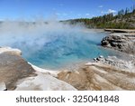 Yellowstone National Park is a volcanically active area, filled with geothermal activity of steam vents, hot springs and geysers