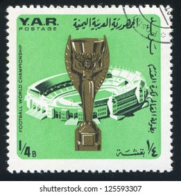 YEMEN - CIRCA 1976: Stamp Printed By Yemen, Shows Jules Rimet Cup And Stadium, Circa 1976