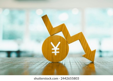 Yen symbol model and down arrow  concepts of systems of raising or lowering Fed interest rates, Japan's economy,  The problem of the depreciating yen continuously. - Powered by Shutterstock