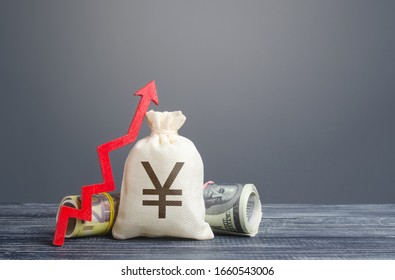 Yen Yuan Money Bag And Red Arrow Up. Economic Recovery And Growth, Optimistic Forecast Of Economic Rise. Market Stability. Influx Of Investment And Capital, Increase Of Wealth. Rising Inflation.