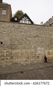 An Yeomen Warders Walks Inside The Tower Of London, England, On The 30th Of October 2009.