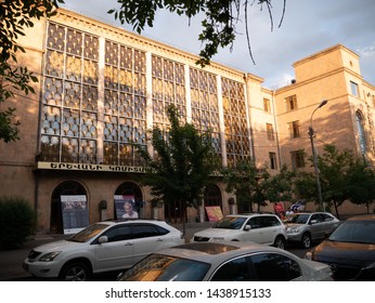 YEREVAN, ARMENIA - MAY 28, 2019:  View Of Komitas State Conservatory Of Yerevan At Golden Hour On A Summer Evening. Sign Translation -  Komitas State Conservatory Of Yerevan. 