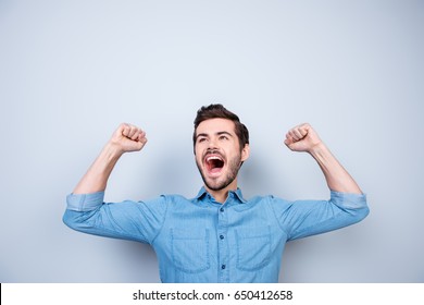 Yes! I Did It! Portrait Of Happy Successful Man With Raised Hands, Shouting