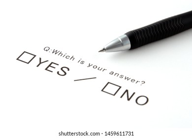 Yes Or No Question And Pen On White Background