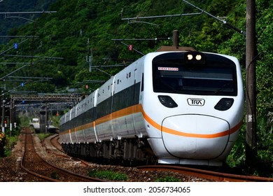 Yilan, Taiwan-9／6／2021: The White Taroko Express Train Climbs Up The Slope And Comes Oncoming.