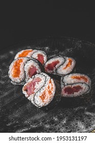 Yin Yang Sushi Roll With Tuna And Salmon On Plate