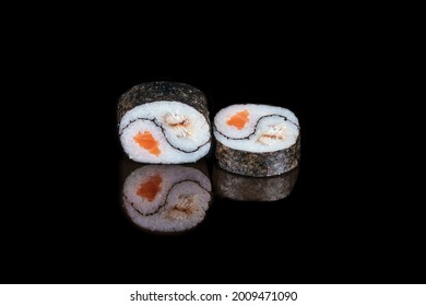 Yin Yang Sushi Roll With Tuna And Salmon On Plate.