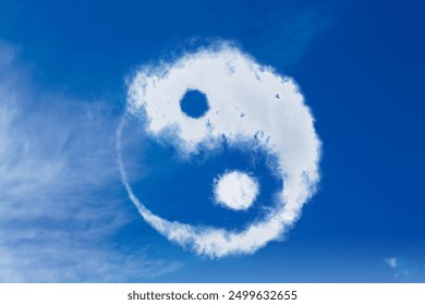 Yin and yang symbol made of clouds in sky