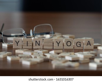 Yin Yoga Concept Represented By Wooden Letter Tiles