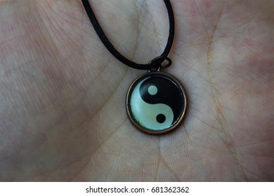 Ying Yang Symbol Necklace Hand Holding