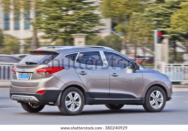 YIWU-CHINA-JANUARY 26, 2016. Beige Hyundai IX 35
SUV on the street. Hyundai car sales in China increased 11.2
percent in 2015, keeping an upward trend for the succeeded car
maker from South
Korea.