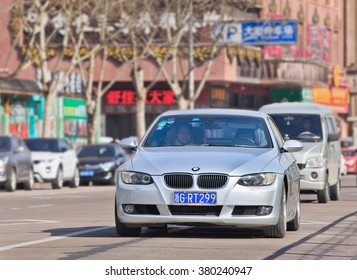 YIWU-CHINA-JANUARY 26, 2016. BMW 3 Series On The Road. BMW Sales Will Be Hit In 2016 By Cut-throat Competition, Slowing Chinese Economy And Government Crackdown On Graft And Conspicuous Consumption. 