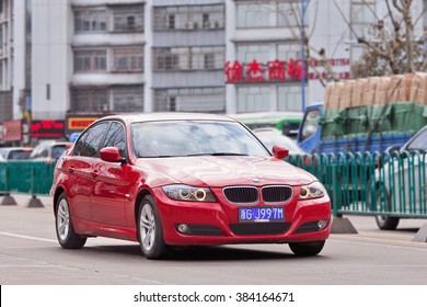 YIWU-CHINA-JANUARY 26, 2016. BMW 3 Series On The Road. BMW Sales Will Be Hit In 2016 By Cut-throat Competition, Slowing Chinese Economy And Government Crackdown On Graft And Conspicuous Consumption.