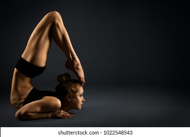 Yoga Backbend Gymnastics, Woman Acrobat in Back Bend Bherundasana Pose, Strong Girl Gymnast Flexible Body