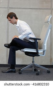 Yoga With Chair In Office - Business Man Exercising 