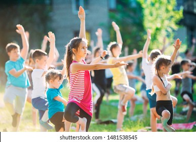 Yoga Classes Outside On The Open Air. Kids Yoga