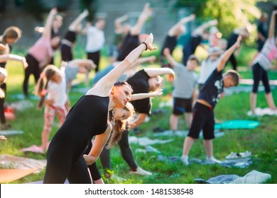Yoga classes outside on the open air. Kids Yoga