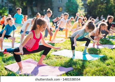 Yoga Classes Outside On The Open Air. Kids Yoga