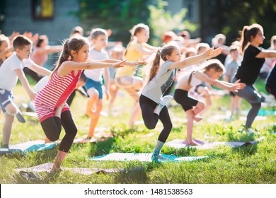 Yoga Classes Outside On The Open Air. Kids Yoga