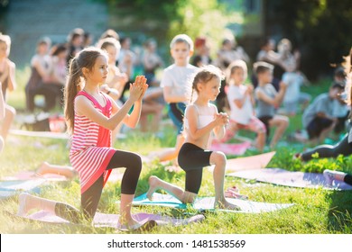 Yoga Classes Outside On The Open Air. Kids Yoga