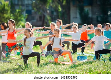 Yoga Classes Outside On The Open Air. Kids Yoga