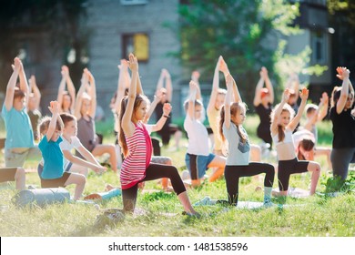 Yoga Classes Outside On The Open Air. Kids Yoga