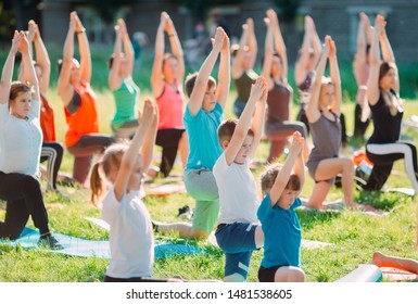 Yoga Classes Outside On The Open Air. Kids Yoga