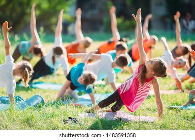 Yoga Classes Outside On The Open Air. Kids Yoga