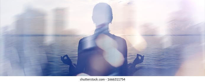 Yoga concept. Double exposure. Woman doing yoga practice on the beach and silhouette of modern city. Blurred effect, lens flare effect, intentional sun glare. Wide screen - Shutterstock ID 1666311754