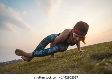 Yoga Eight Angle Pose In Nature During Sunset