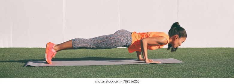 Yoga Fitness Woman Practicing Chaturanga Pose Push Ups Press Up On Exercise Mat At Outdoor Home. Fit And Healthy Young Girl Doing Morning Core Body Workout Pushup Strength Training. Banner Panorama.