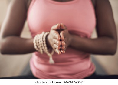 Yoga, girl and namaste for chakra, meditation and spiritual awareness or reiki balance. Female person, self care and healing aura for mental health or holistic in studio, prayer hands and mala beads