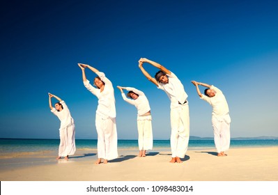 Yoga Group At The Beach