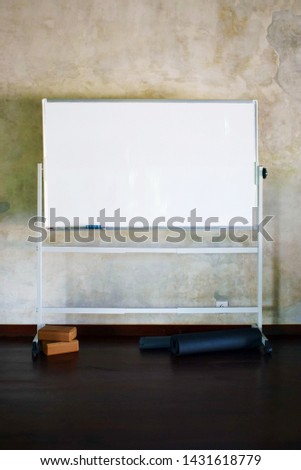 Yoga Hall Empty Mobile Presentation Magnetic Whiteboard on Wheels with Yoga Mat and Bricks 