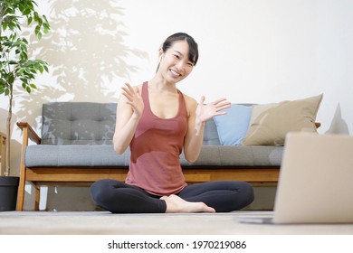 Yoga Instructor Talking To The Computer Screen