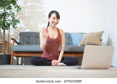 Yoga Instructor Talking To The Computer Screen