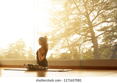 A Yoga Master Practicing Yoga Streching Back And Shoulder Muscle