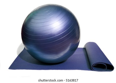 Yoga Mat And Pilates Ball Isolated On White Background