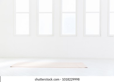 Yoga Mat In A White Room