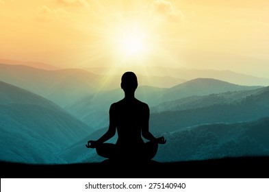  Yoga and meditation. Silhouette. - Shutterstock ID 275140940