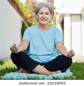 Yoga Is My Secret. Shot Of A Senior Woman Doing Yoga Outside In Her Yard.