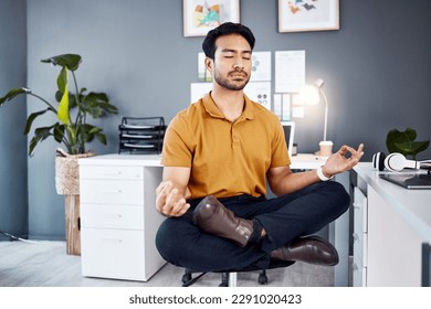 Yoga, night and business man in office for mental health, relax and breathing exercise at a desk. Corporate, meditation and asian guy manager meditating for stress management, zen and peace in Japan - Powered by Shutterstock