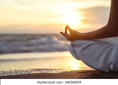 Yoga on the beach - Powered by Shutterstock