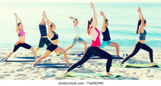 Yoga On Beach Group People Practicing Stock Photo 756982990 | Shutterstock