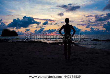 Yoga on the beach: standing
