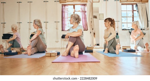 Yoga, personal trainer and senior women community, group and support for healthy life, wellness and body stretching. Elderly, coach and yoga class people on floor in pilates, cardio or workout studio - Powered by Shutterstock