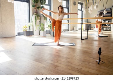 Yoga Pose Asana Confident Woman Workout Exercises , Gymnastics And Pilates. Sports Equipment Is Used In The Fitness Club.