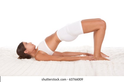 yoga pose "Bridge" - female in sport clothes performing exercise